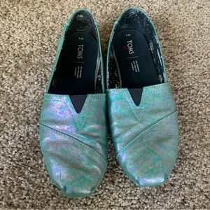 Iridescent blue Toms slip on shoes
